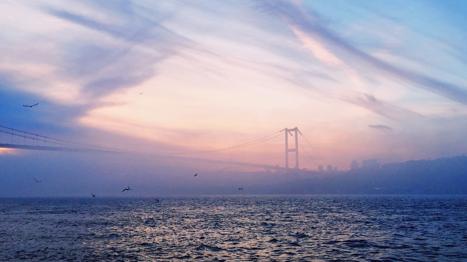 Bosphorus strait with Istanbul skyline at sunset